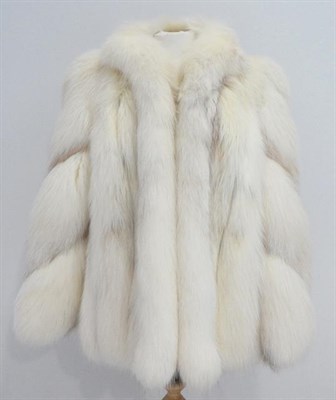 Lot 2094 - A Whiteheads of Montpellier, Furriers, Harrogate White Fox Fur Jacket, with stylish long...