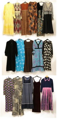 Lot 2098 - Sixteen 1970's Maxi Dresses, comprising a Jean Varon black velvet and floral dress, the square...