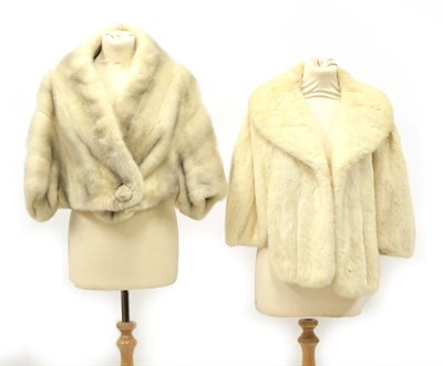 Lot 2100 - A Blonde and Grey Mink Bolero, with single button fastening; and A Conklin Furs Blonde Mink Capelet