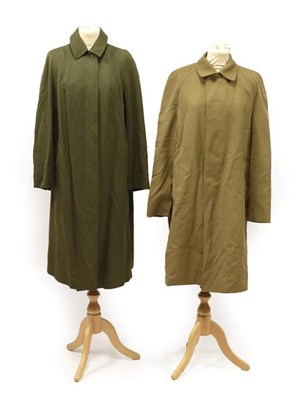 Lot 2101 - A Circa 1970's Burberry's Coat, in military green cotton with four button fastening and slit...
