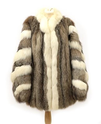 Lot 2106 - A White and Silver Fox Fur Jacket, the sleeves striped in the two furs