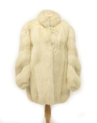 Lot 2108 - A White Arctic Fox Fur Coat, with upturned collar