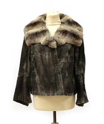 Lot 2115 - A Grey Chinchilla Jacket, the bodice of jacket shaved and collar full fur, the grey lining...