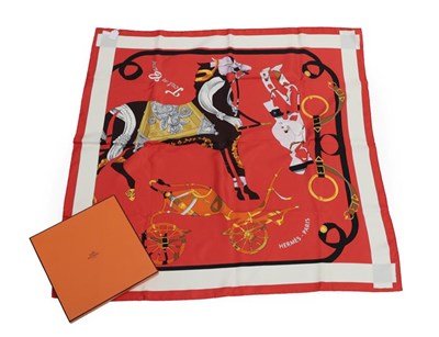 Lot 2187 - A Hermès 'Tout en Carré' Silk Scarf, Designed by Bali Barret, printed with an abstract design...