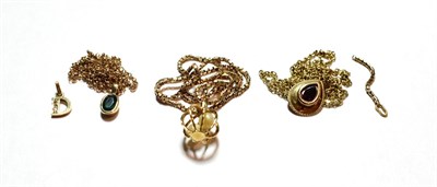 Lot 43 - Three pendants on chains, the chains stamped '375' (one chain a.f.); and a 9 carat gold pendant