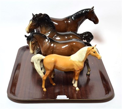 Lot 76 - Beswick horses including a cantering Shire; mare (facing left); a Palomino Arab; and a foreign...
