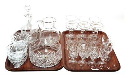 Lot 79 - A set of six stemmed glasses; a water jug and six beakers; set of six sherry glasses; an etched...