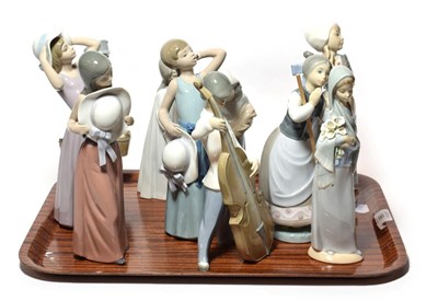 Lot 86 - Lladro figures of women and girls, and a boy playing a double bass (10)