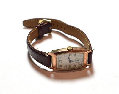 Lot 113 - A 9 carat gold tonneau shaped wristwatch, signed Asprey, case with an Edinburgh hallmark for 1940