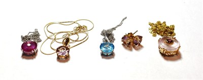 Lot 124 - Four gem set pendants on chains, all stamped '10K' or '375'; and a pair of gem set earrings,...