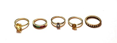 Lot 133 - A paste set eternity ring, stamped '9CT', finger size P; and four assorted 9 carat gold gem set...
