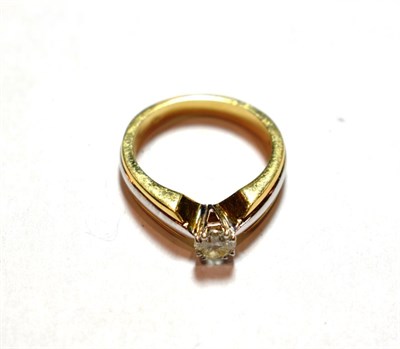 Lot 170 - A diamond solitaire ring, stamped '750', finger size N1/2