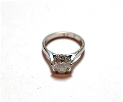 Lot 174 - A platinum diamond solitaire ring, the round brilliant cut diamond in a six claw setting on a...