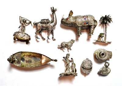 Lot 178 - A collection of silver and metalware toys and miniatures, comprising: a filigree rhinoceros,...