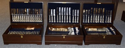 Lot 213 - Silver-plated Kings pattern flatware for twenty-four place settings, housed in two canteens and...