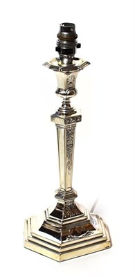 Lot 226 - An Edward VII silver candlestick, by John Round & Son Ltd., Sheffield, 1901, the base...