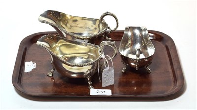 Lot 231 - Three Victorian and later sauceboats, one by George Unite, Birmingham, 1897, one by Thomas Bradbury