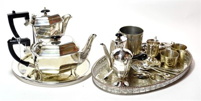 Lot 246 - A quantity of silver and silver plate: including: a silver lidded twin-handled cup, Adie...