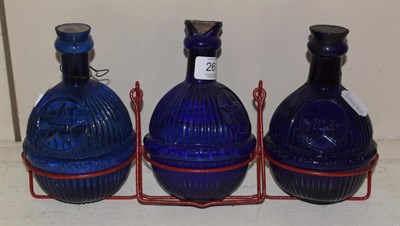 Lot 261 - A group of three fire bombs, still with contents