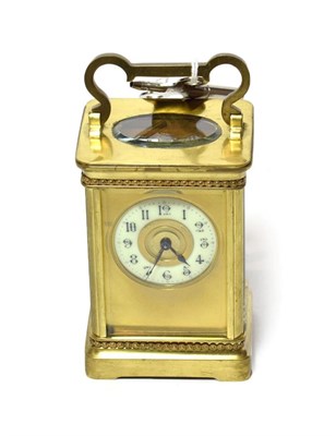 Lot 284 - A brass carriage timepiece, circa 1900