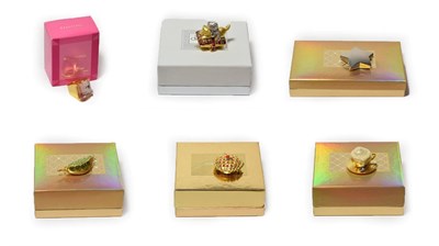 Lot 310 - Six assorted Estée Lauder solid perfume compacts, comprising 'Shining Star'; 'Beautiful...