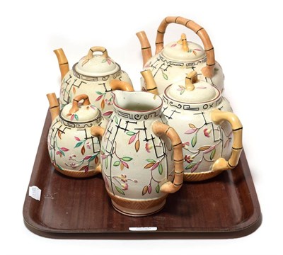 Lot 311 - Victorian Japanese style tea wares comprising of four various sized teapots and a jug (5)