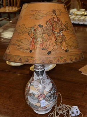 Lot 323 - A Japanese Satsuma vase converted to a lamp, with a decorative parchment shade