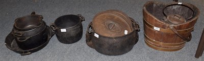 Lot 330 - A group of cast iron skillets and pans etc; together with a coopered oak pail