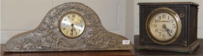 Lot 342 - An Arts and Crafts style mantel timepiece; and a pigeon ''Blick Universal'' clock timer (2)