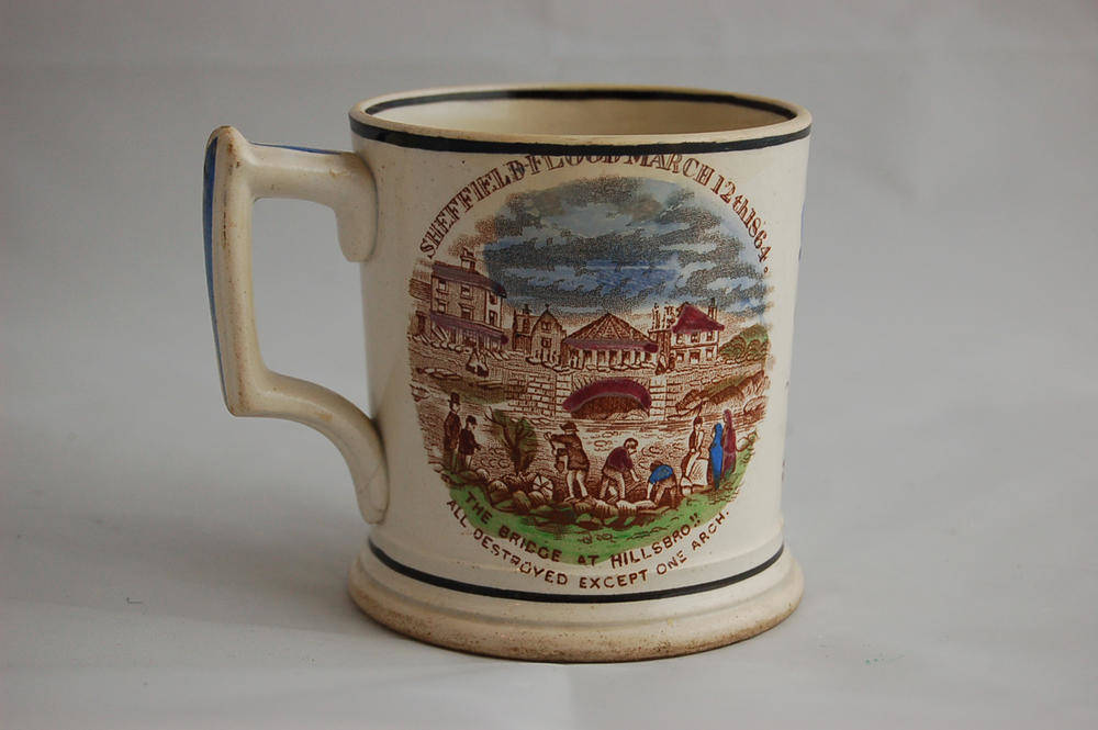 Lot 98 - A Staffordshire Pottery "Sheffield Flood" Commemorative Mug, circa 1864, of cylindrical form,...