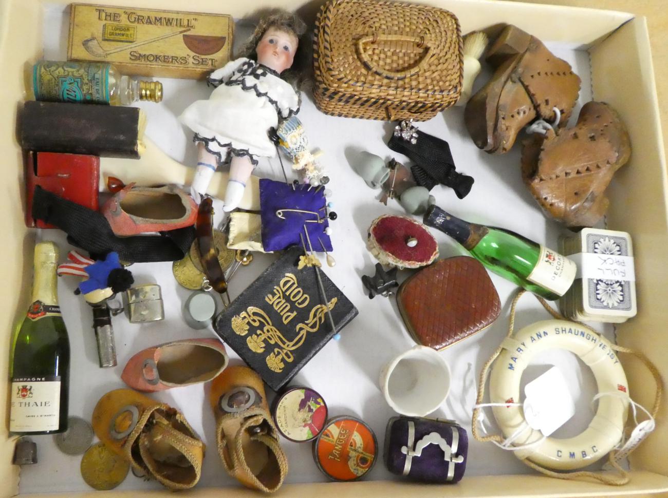 Lot 1061 - Assorted mainly 20th century dolls accessories including a pair of clogs with punched leather...