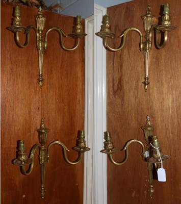 Lot 1132 - Set of four, two branch Empire style wall sconces