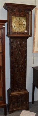 Lot 1146 - ~ A carved oak eight day longcase clock, dial inscribed M.Wedred, K.Lonsdale, 18th century and...