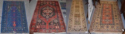 Lot 1159 - A Caucasian design rug, the camel field with five panels of zoomorphic devices enclosed by serrated