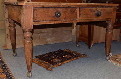 Lot 1164 - A late 19th century pine kitchen table with two drawers and drop leaf