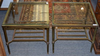 Lot 1180 - A near pair of mid 20th century, glass topped brass occasional tables, each with reeded legs...
