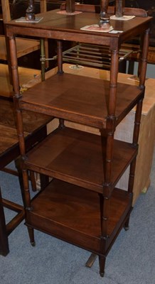 Lot 1181 - A 19th century mahogany four tier whatnot, fitted with one base drawer and a easel top