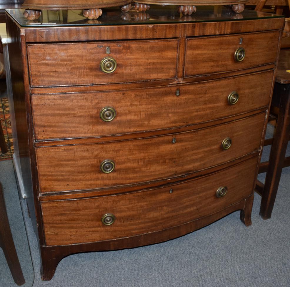 Lot 1185 - A George III mahogany four height bow fronted chest of drawers, 96cm by 98cm by 52cm
