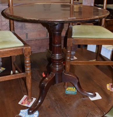 Lot 1187 - A George III mahogany dish topped tilt top tripod table