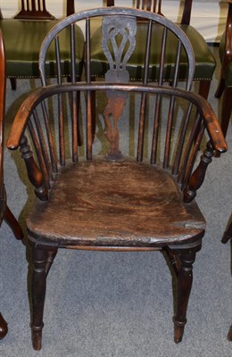 Lot 1226 - A 19th century yew and elm Windsor chair