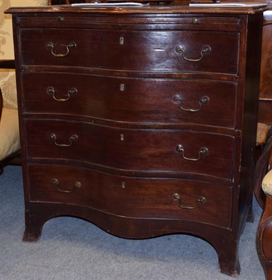 Lot 1231 - A George III crossbanded mahogany serpentine fronted chest of drawers, the moulded top above a...