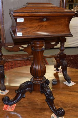 Lot 1236 - A Victorian rosewood teapoy, with caddy top, baluster standard and scroll carved legs (empty), 79cm