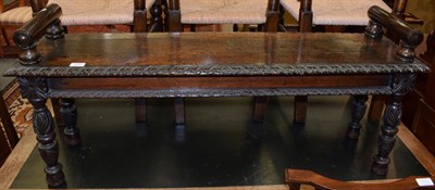 Lot 1245 - A Victorian carved oak window seat, 52cm by 118cm by 31cm