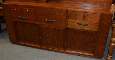 Lot 1247 - A modern Starbay Indian rosewood sideboard, fitted with a bank of eight drawers and two...