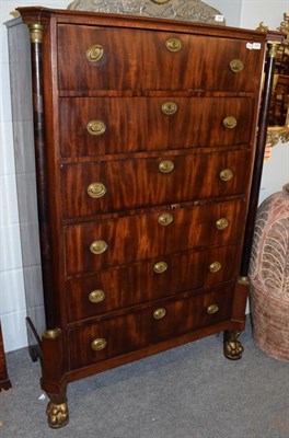 Lot 1276 - A late 19th century French Empire style mahogany chest of drawers, the six long drawers flanked...