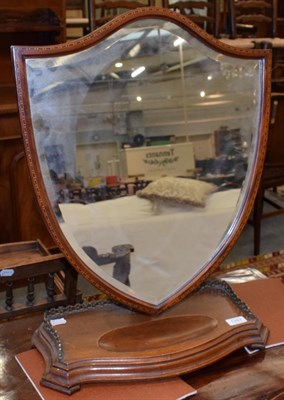 Lot 1287 - A 19th century mahogany shield back dressing table mirror