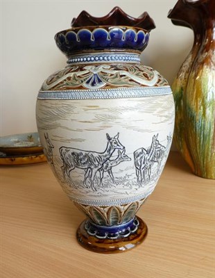 Lot 1001 - Hannah Bolton Barlow (1851-1916): A Doulton Lambeth Stoneware Vase, incised with two figures on...