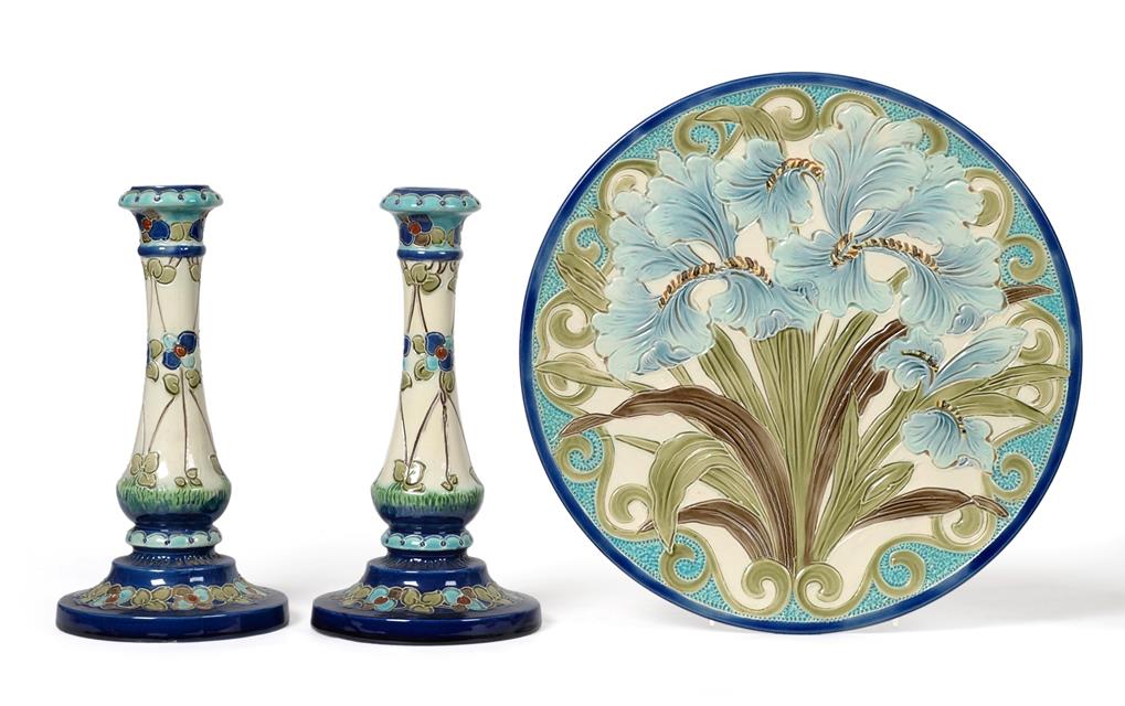 Lot 1009 - A Burmantofts Faience Pottery Charger, decorated with blue iris, in tones of blue, green and brown