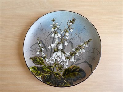 Lot 1011 - Christopher Dresser (Scottish, 1834-1904) for Linthorpe Pottery: A Plate, decorated with...