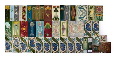 Lot 1019 - Twelve Art Nouveau Tube Lined Border Tiles, in turquoise and green, stamped 1673, 15cm by 7.5cm...